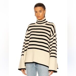 Toteme Signature Stripe Turtleneck Sweater
$570 Black and Cream Striped Size XXS